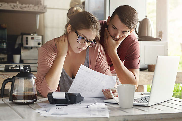 A couple dealing with debt.