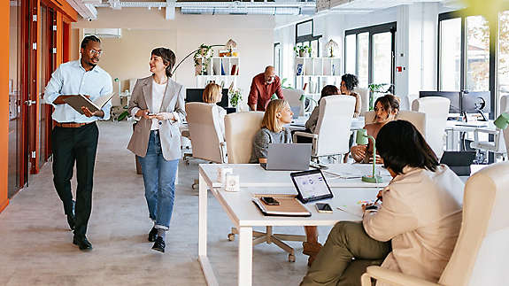 Employees walking around the office