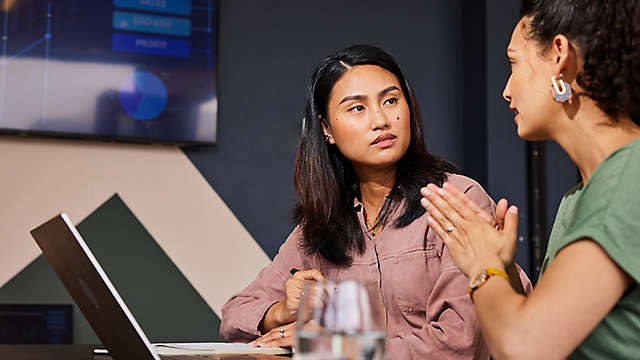 Two women talking to eachother