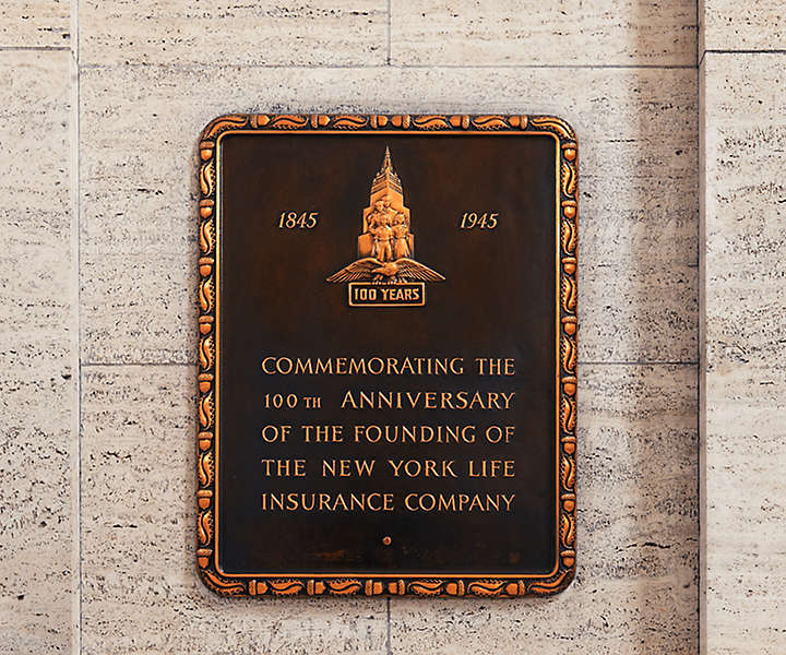 A plaque commemorating the company's 100th anniversary was unveiled in the New York Life Home Office lobby in 1947 rather than 1945 due to World War II