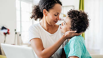 Mother guides her bereaved child