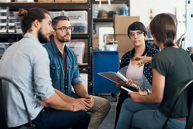 Employees having a meeting.
