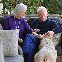 Jill and Mike sitting on porch.