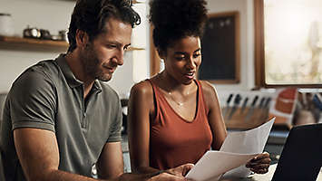 Couple reviewing their finances.