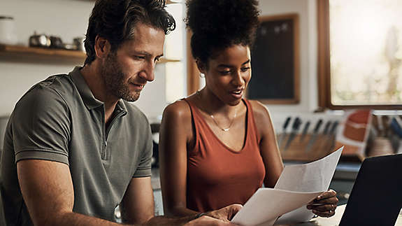 Couple reviewing their finances.