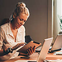 Women working at her desk.