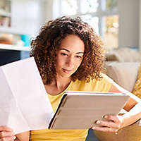 Young women looking at paperwork.