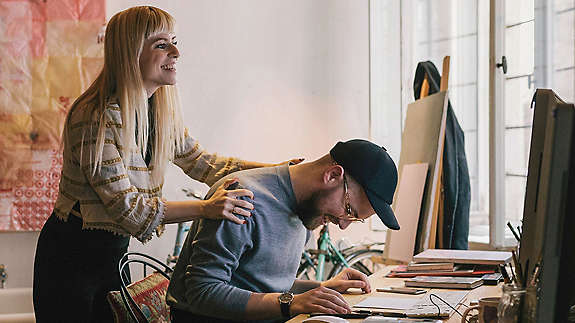 Man and woman laughing 