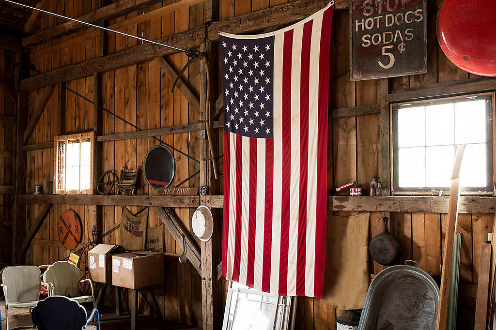 American flag hanging on a wall.