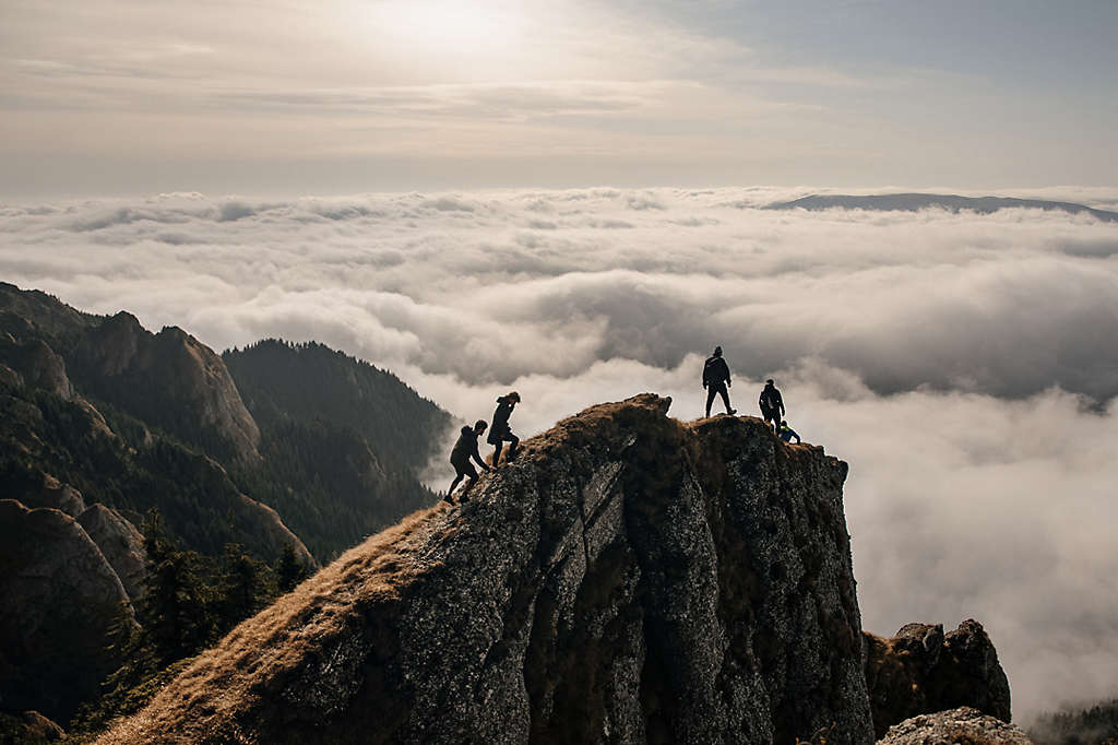 Hikers on a vantage with a wide view.