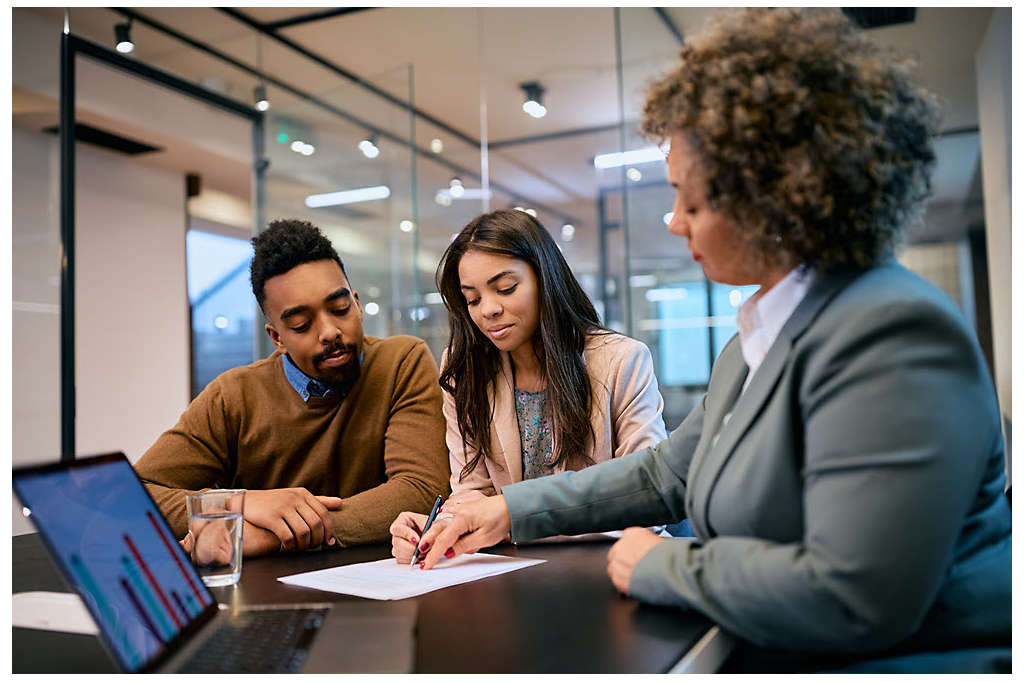 An agent with her clients.