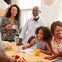 Family having breakfast in kitchen