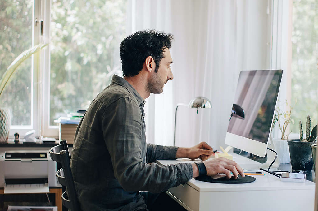 Corporate man working at computer