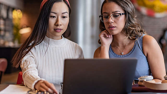 Two women working on a project