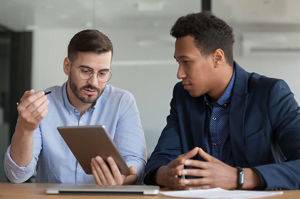 Two men working