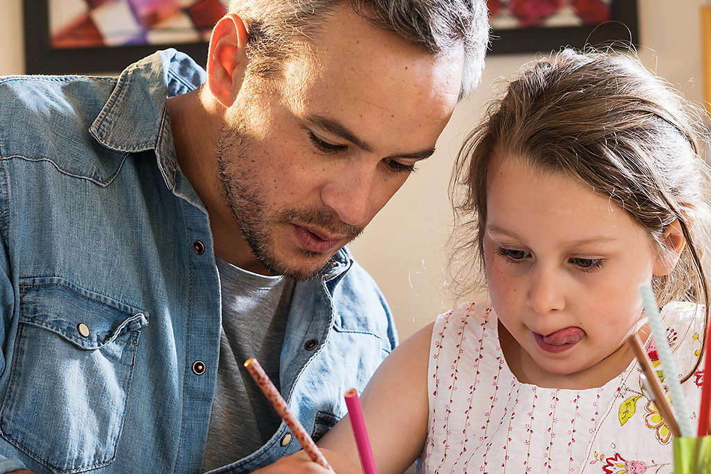 Father and daughter drawing