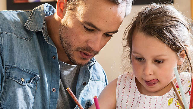 Father and daughter drawing