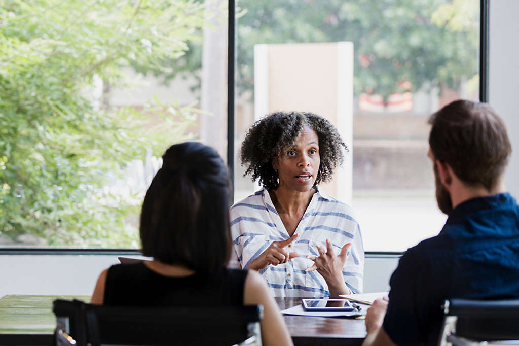 Fiduciary sitting with clients