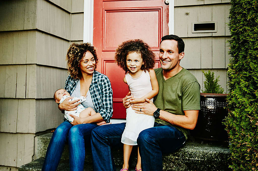 Family sitting on steps