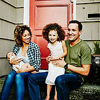 Family sitting on steps