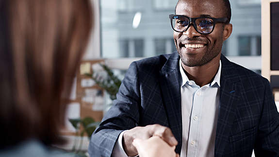 Optimistic qualified man is interviewing lady