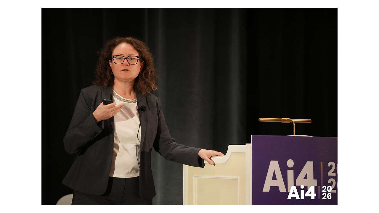 Woman standing at a podium