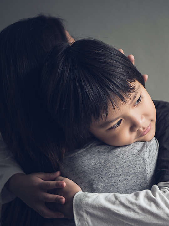 Mom comforting son