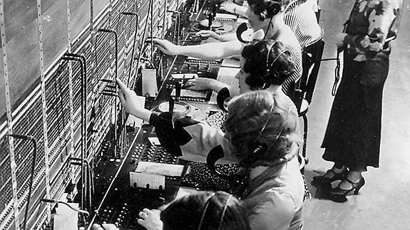 Photograph of the women of New York Life operating a switchboard in the 1930s.