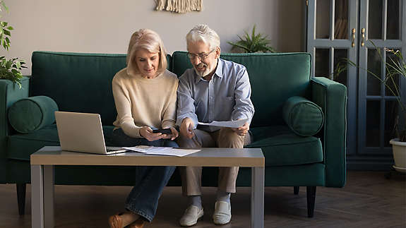 Elderly couple on couch