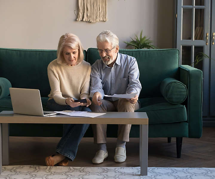 Elderly couple on couch