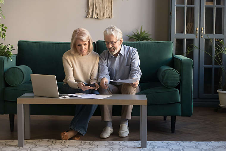 Elderly couple on couch