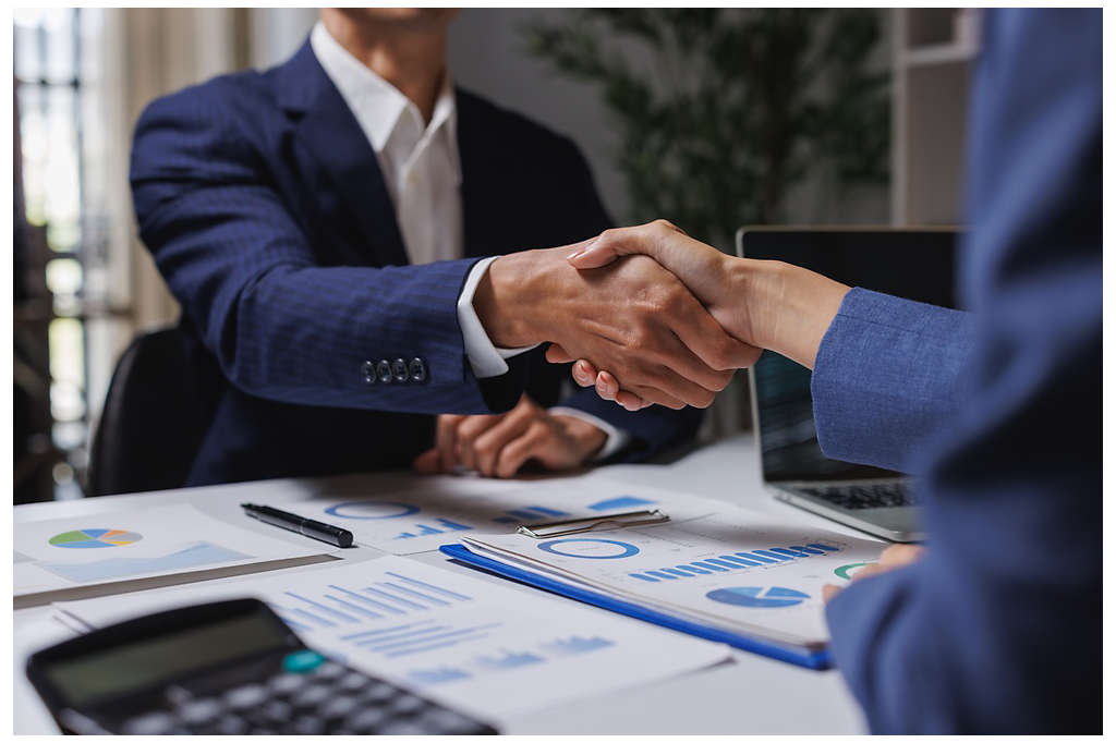 two business people shaking hands