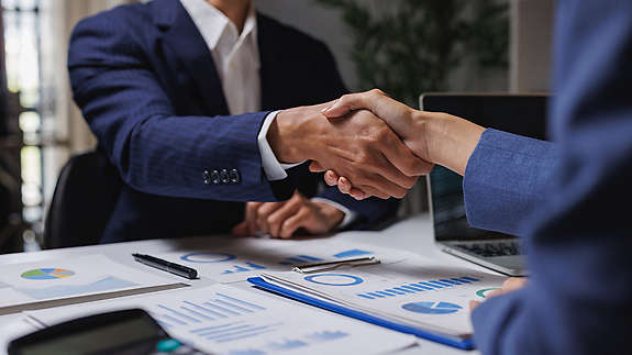 two businesspeople shaking hands