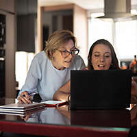 SEO-24-3x2-two-women-looking-at-laptop.jpg