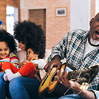 family-playing-guitar.jpg