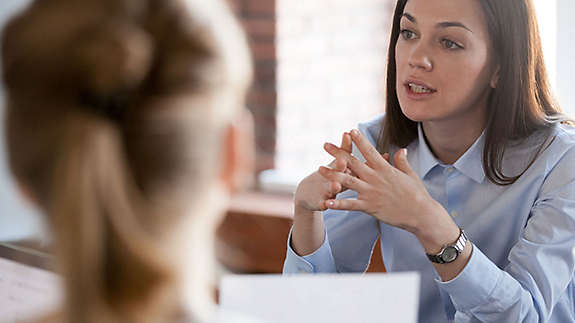 Two women talking 