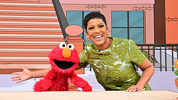 Elmo with a woman