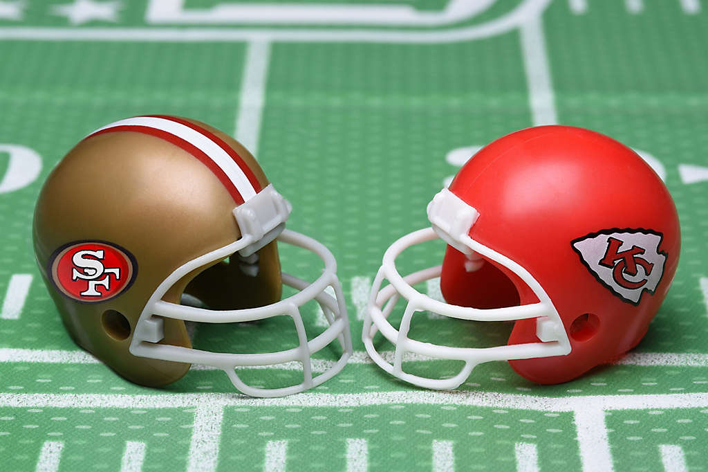 San Francisco 49ers logo and Kansas City Chiefs logo on football helmets