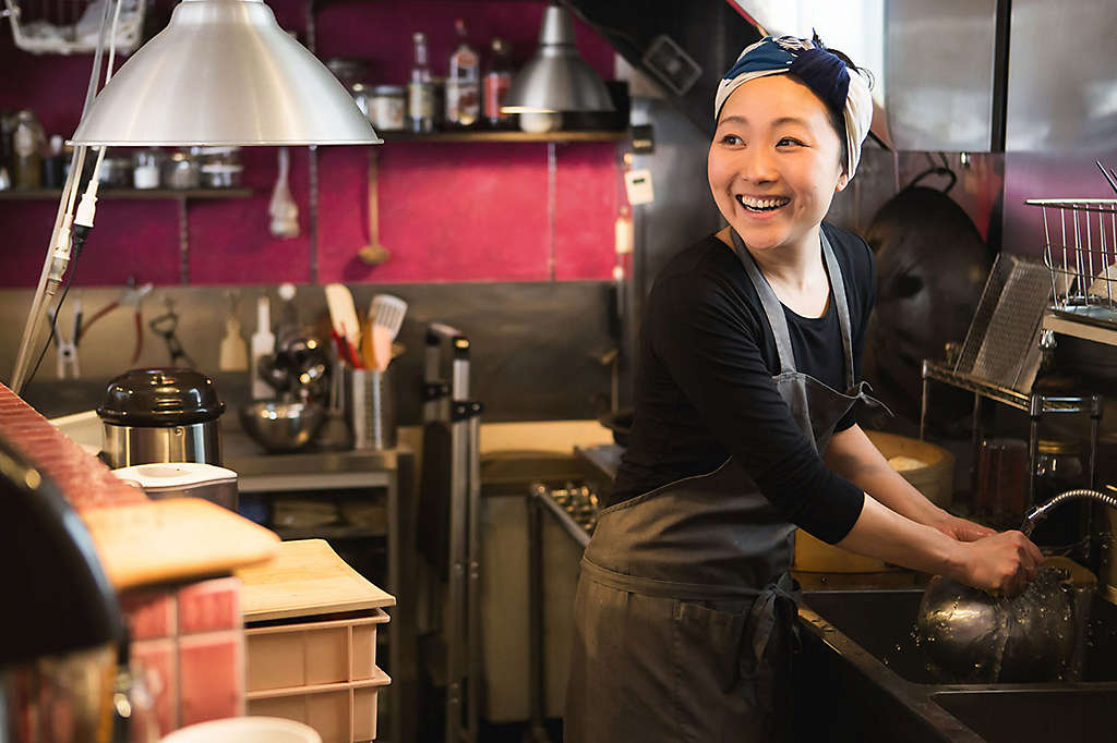 Small business owner working in her kitchen