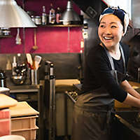 Small business owner working in her kitchen