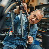 Man working in bicycle shop