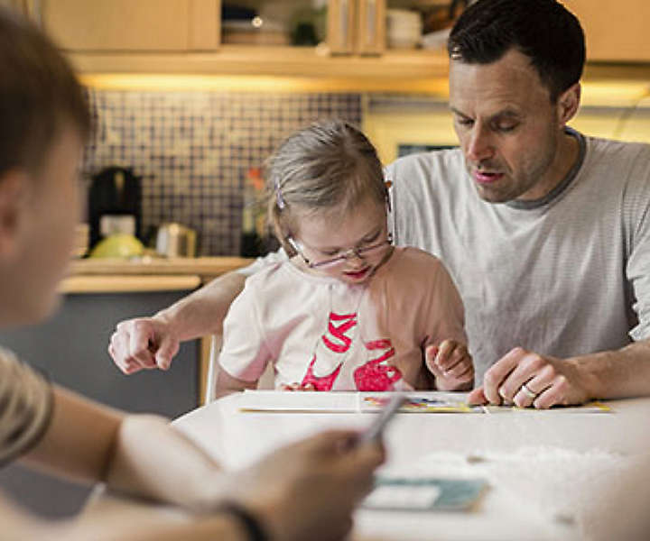 Father with his two young children