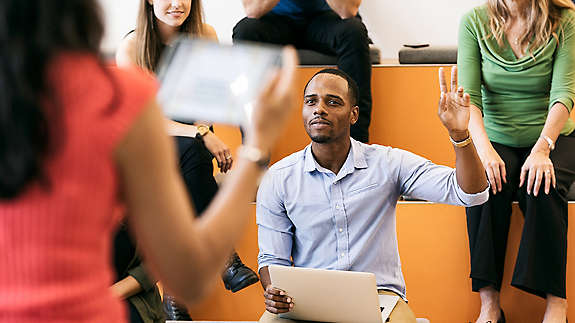 Man raising hand presentation