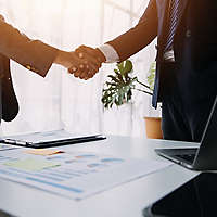 Business handshake for teamwork of business merger