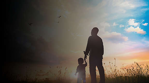 A father with his son admiring the landscape