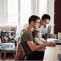 Family with young child researching investment diversification