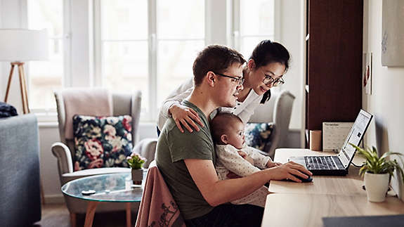 Family with young child researching investment diversification