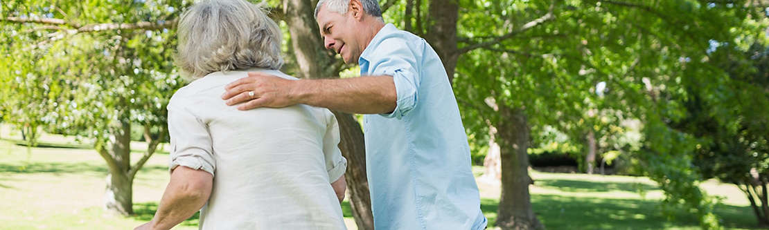 Elderly couple walking