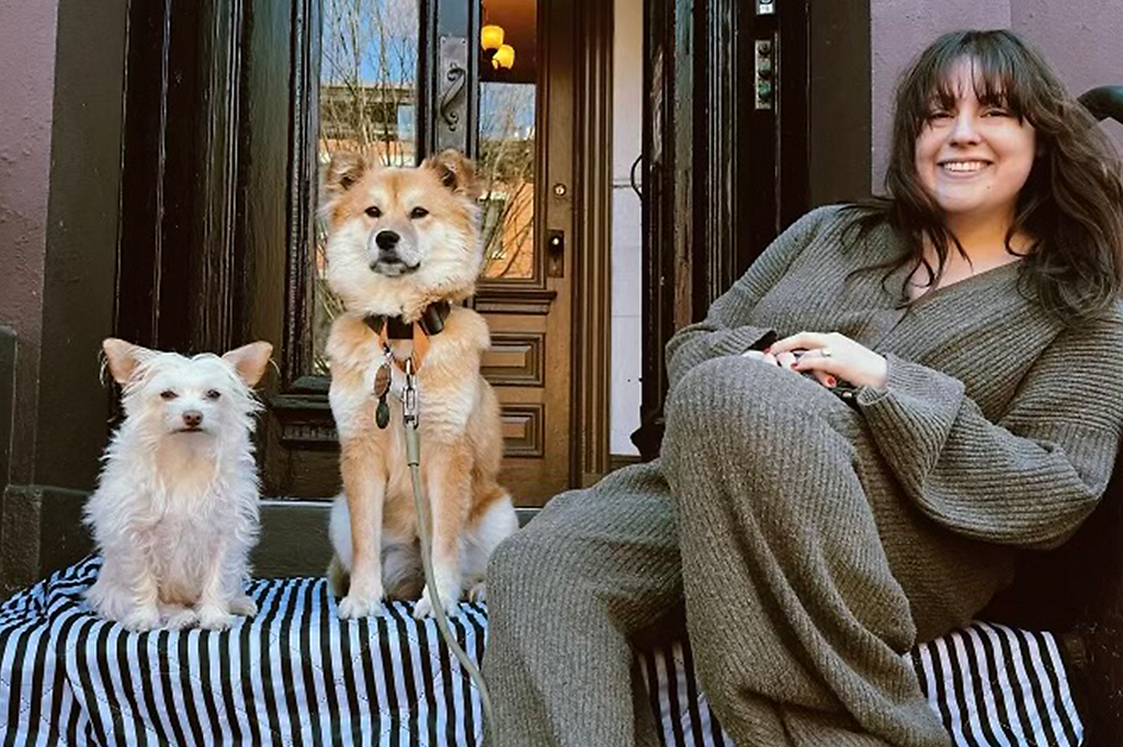 Emma Clarke with her two dogs