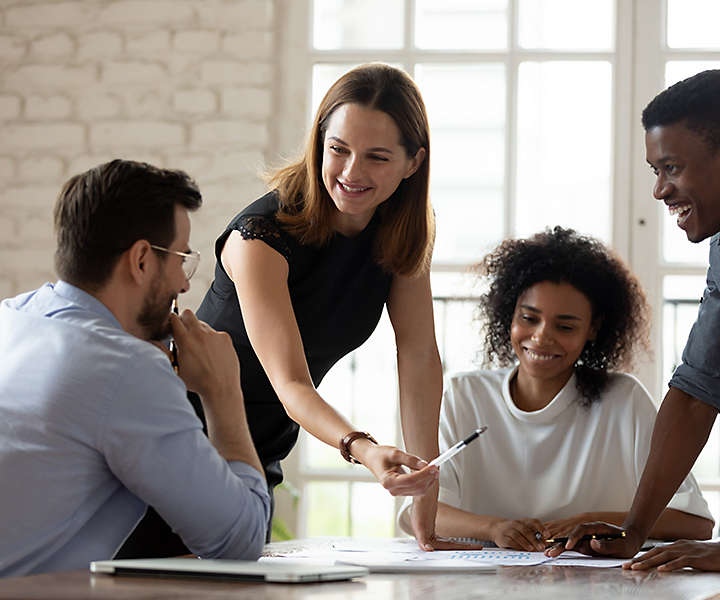 A  group of coworkers working in the office